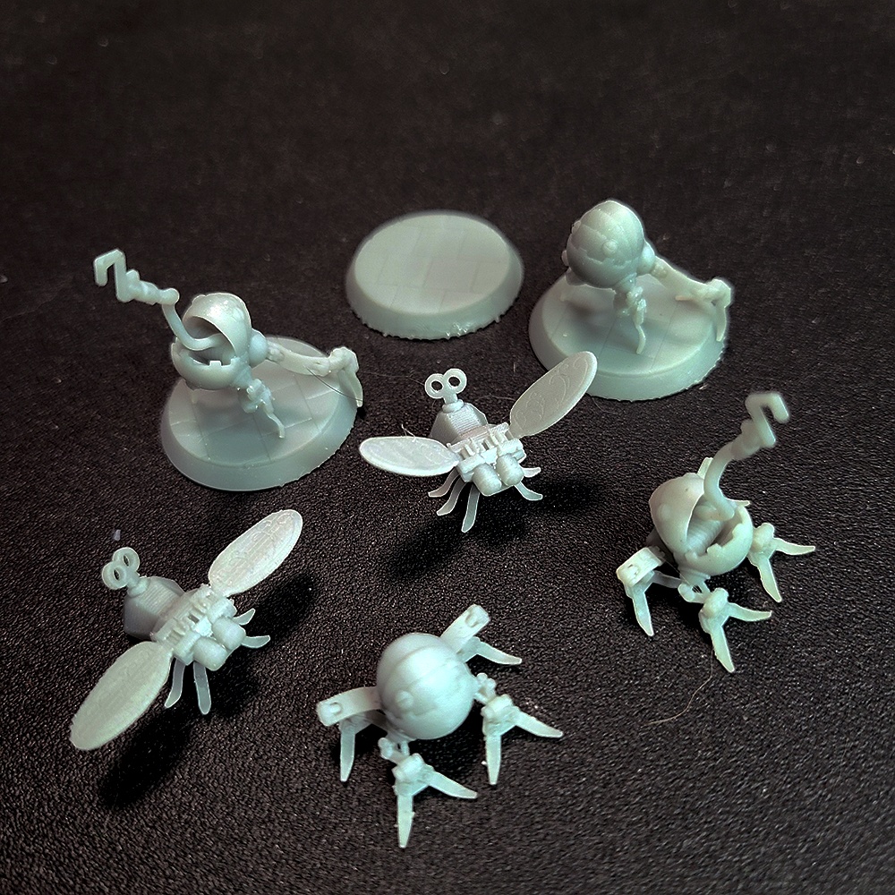 CLOCKWORK FROGS AND FLIES