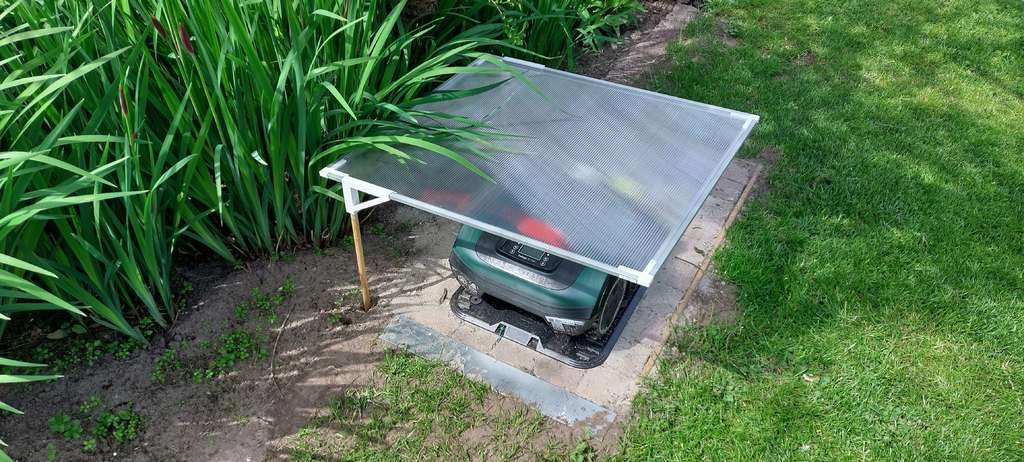 Minimalistic Robot lawn mower garage