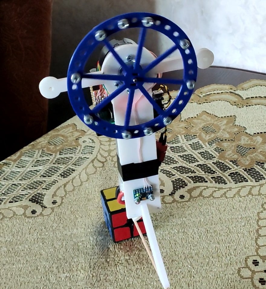 One axis reaction wheel self balancing stick