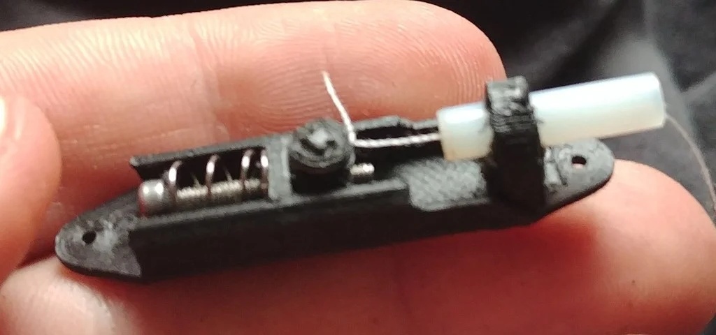 Tendon Tensioner and Shock Absorber for Robot Tendons (Series Elastic Actuator)