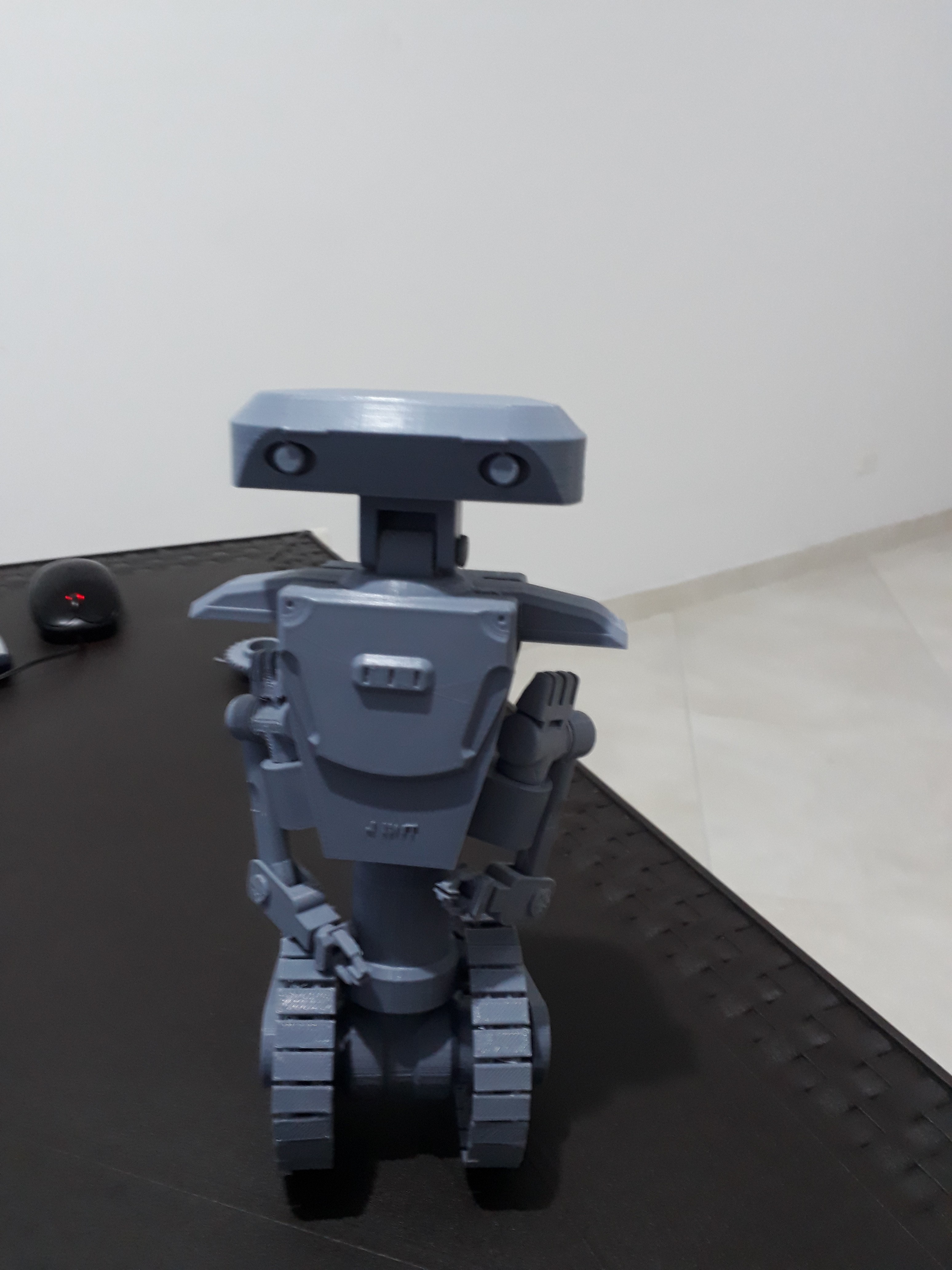 ROBOT WITH CATERPILLAR