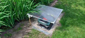 Minimalistic Robot lawn mower garage