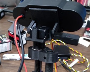 Servo tilt plate