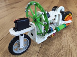 Self balancing bike with reaction wheel