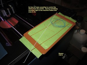 TAPE MOUNT TO COLLECT PRINTER DEBRIS