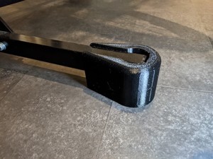 Footprint expansion and protection from robot cleaners for Minoura bike stand