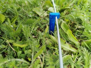 Perimeter wire holder for robot lawn mover